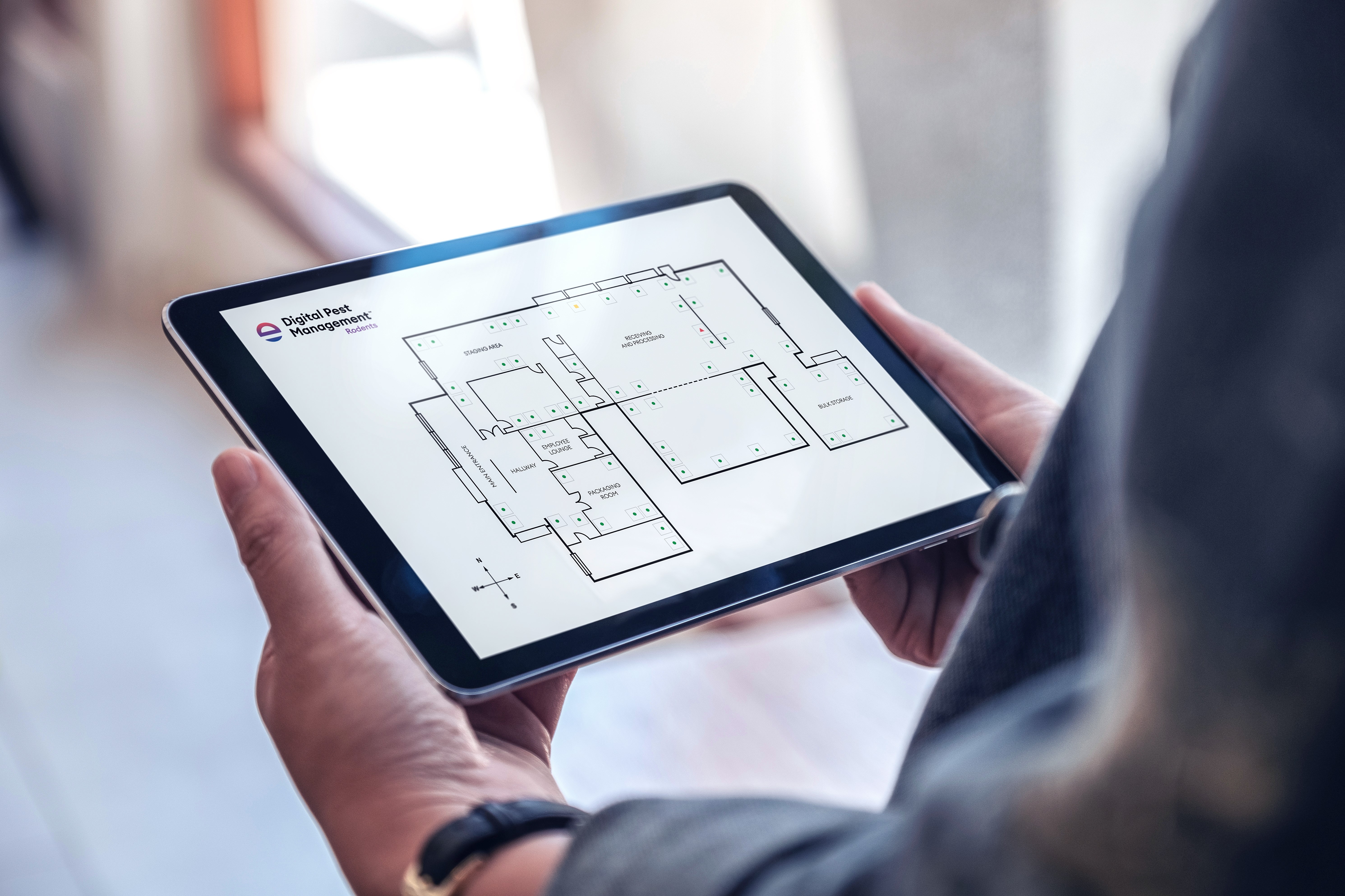 Image of the digital pest management app on a phone