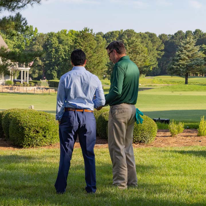 two men discussing solutions