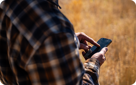 rancher tapping cell phone